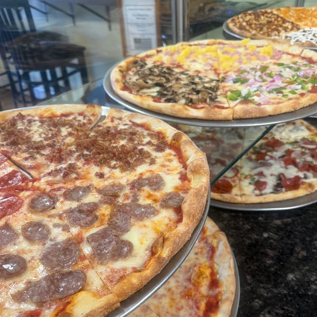Buy Two Large Pizzas, Get a Free 2-Liter Soda.